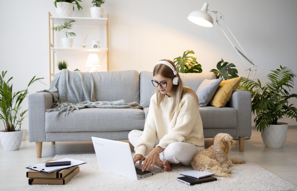 woman working remote in her pijamas