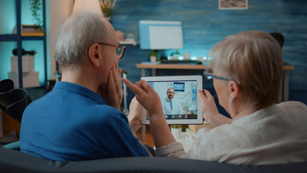 aged man and woman using uhealth medicine