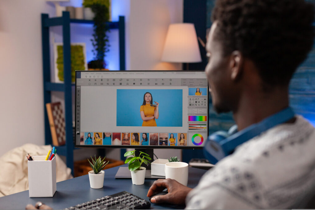 photographer editing css color formats in his office