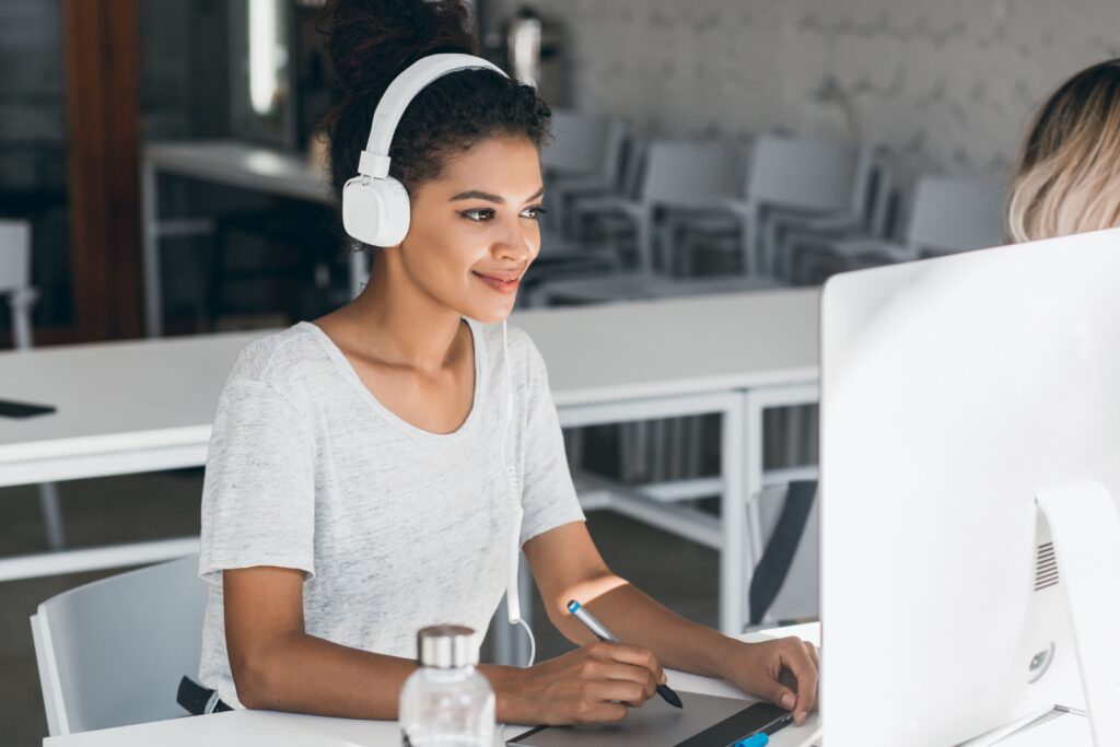 Developer woman mastering professional english with her computer