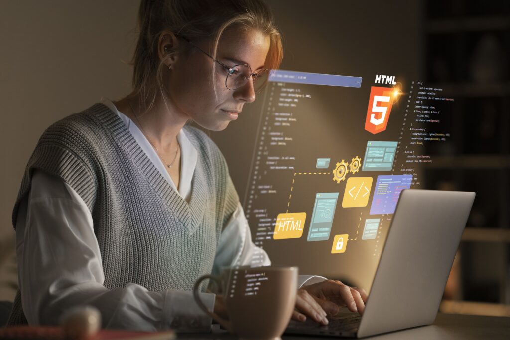 Woman developer working with his laptop and her development tools