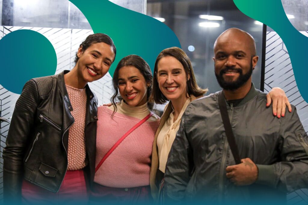 tech industry hiring team smiling in the office