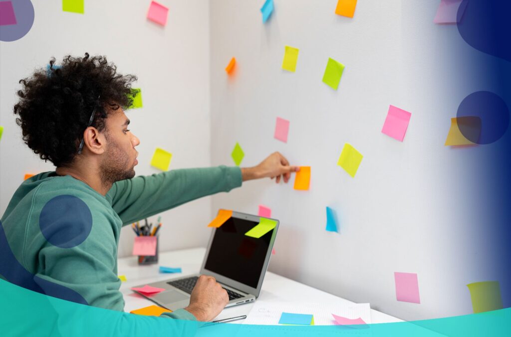 Developer in the office taking notes on upskilling and reskilling